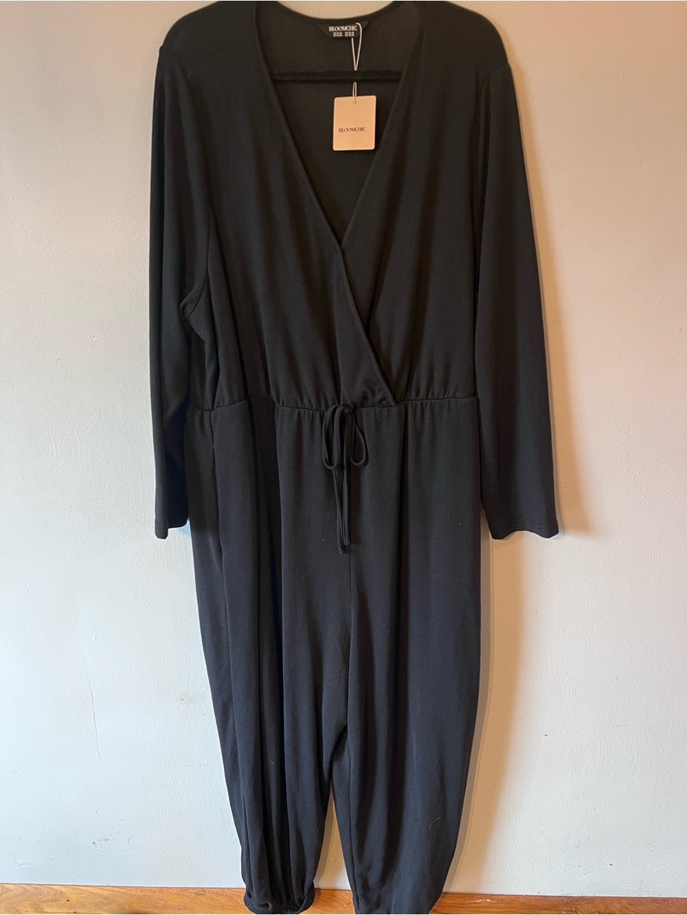 BloomChic Black Long-Sleeve Wrap Jumpsuit with Drawstring Waist